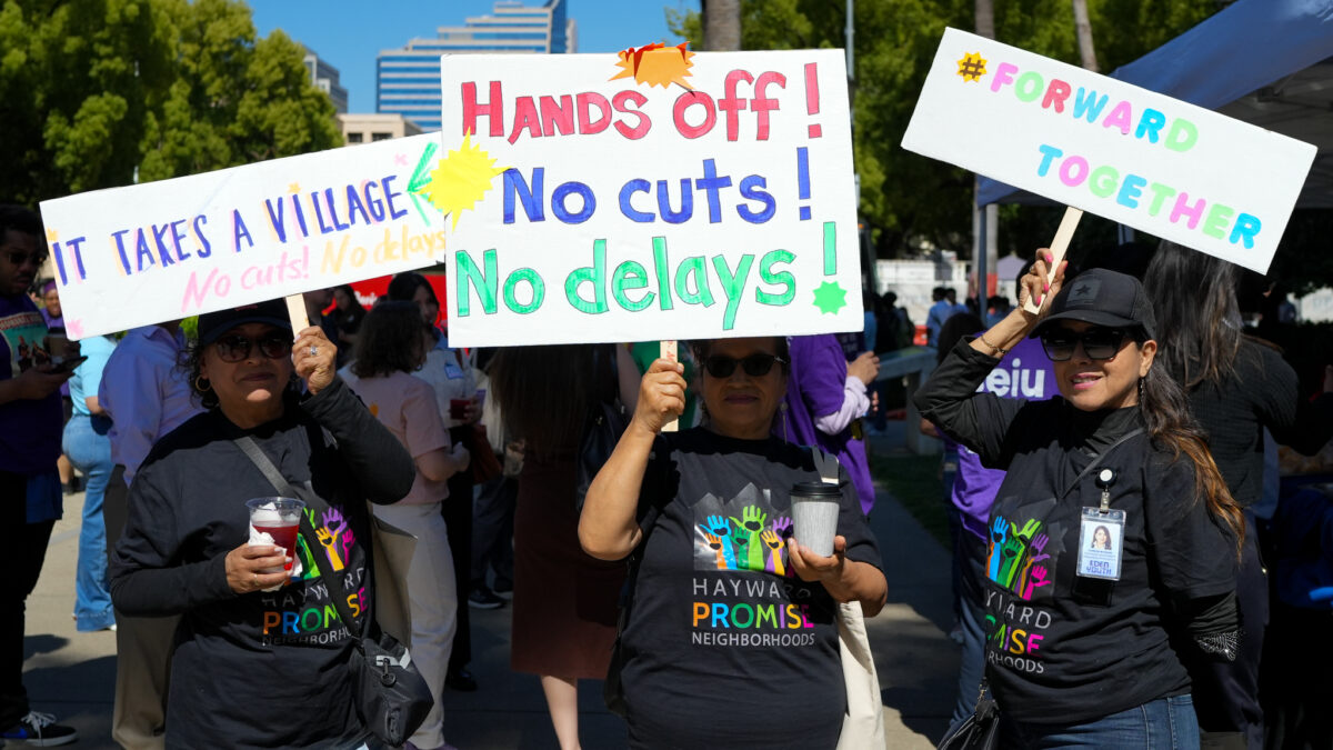 Women at a child care rally at California's capitol, advocating for more support for the child care system.